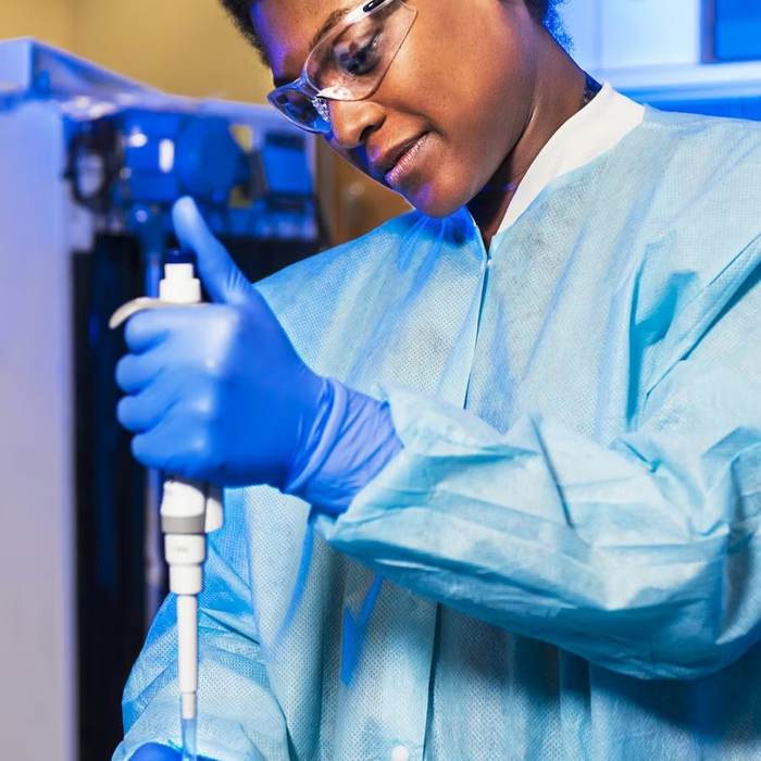 Laboratory scientist preparing analytical samples