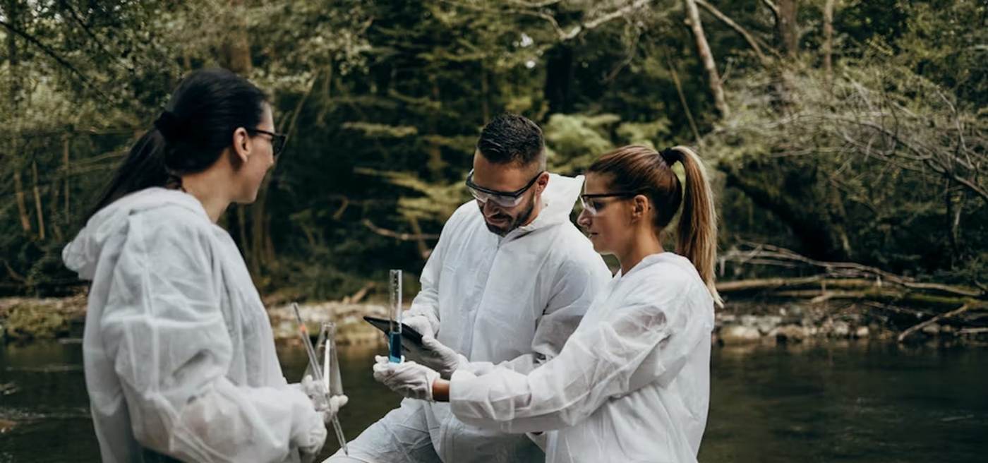 Water quality sampling team at stream
